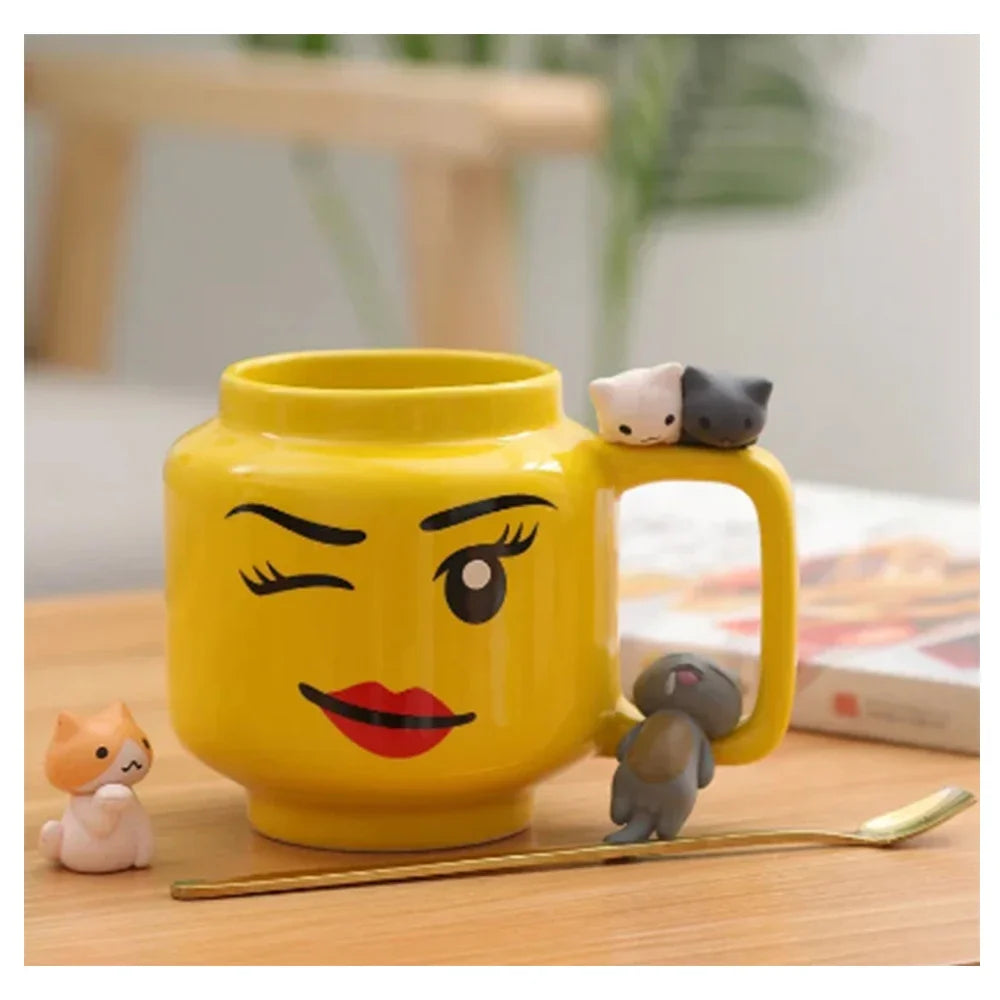Yellow mug with a face design on a wooden table