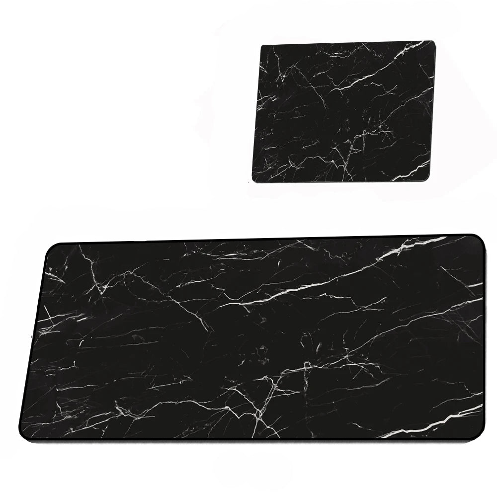 Two black marble-patterned mouse pads on a white background