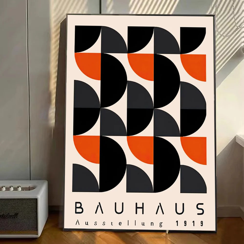 Bauhaus poster print with a repeating black, grey, and orange quarter-circle geometric pattern