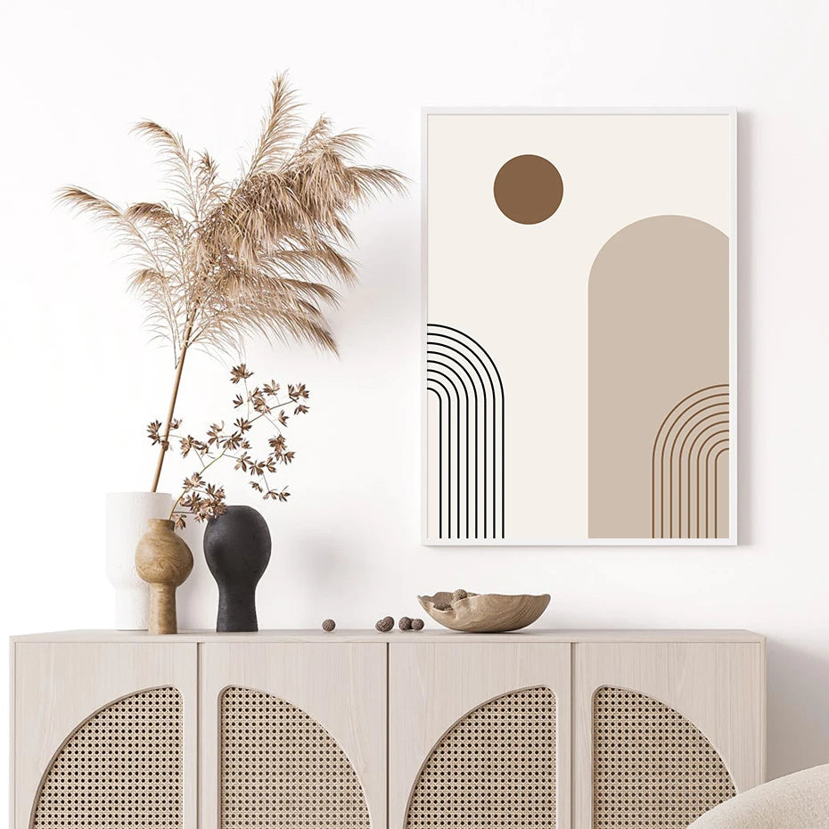 Decorative setting with abstract art, vases, and a cabinet in a minimalistic room.