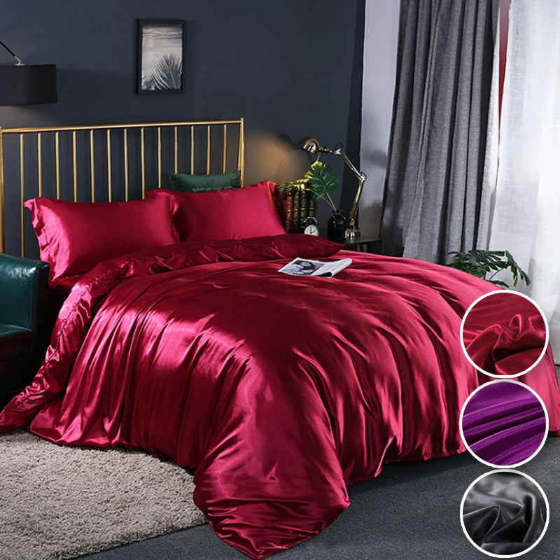 Red satin bedding set on a bed in a bedroom with close-up details of fabric texture.