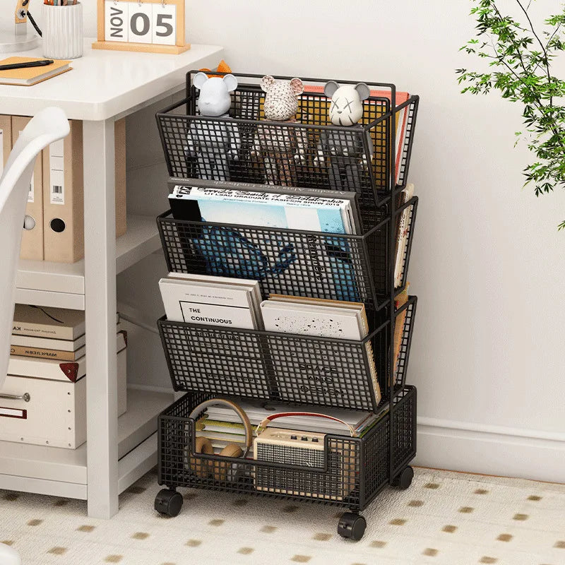 A black metal rolling file organizer with five tiers and wheels, shown holding books, notebooks, and small decorative items in a home office setting next to a white desk.