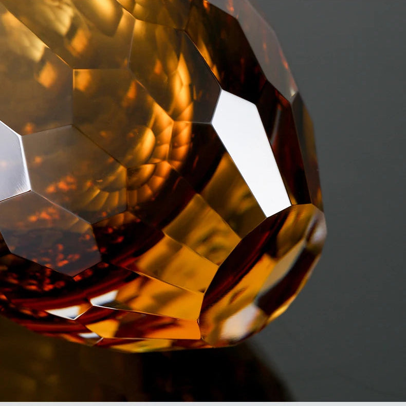 Close-up detail of amber faceted prism glass texture