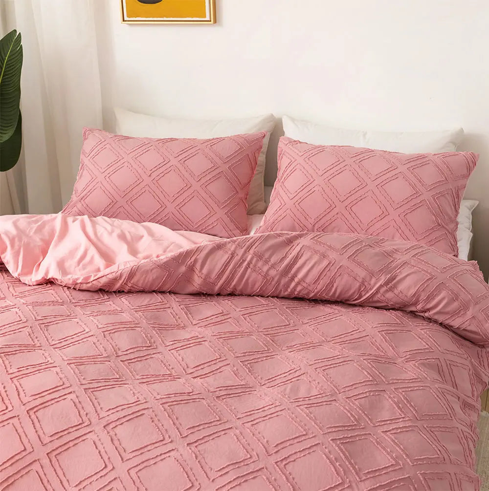 Blush pink textured geometric bedding set with raised diamond pattern
