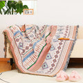 Indian style woven throw with horizontal stripes of blue, red, and white geometric patterns.