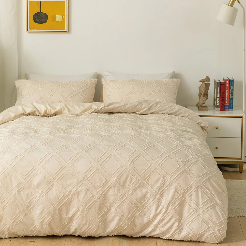 Cream textured geometric bedding set with matching pillowcases styled on a minimalist bed