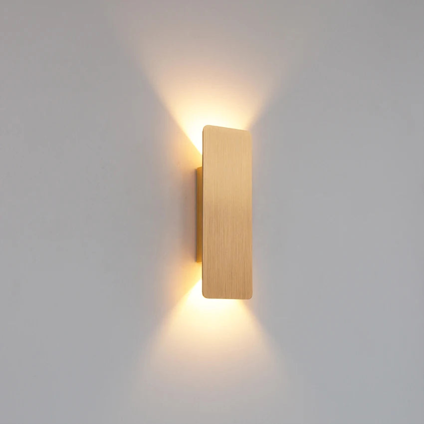 Gold 6W wall-mounted LED light with warm ambient up-and-down illumination