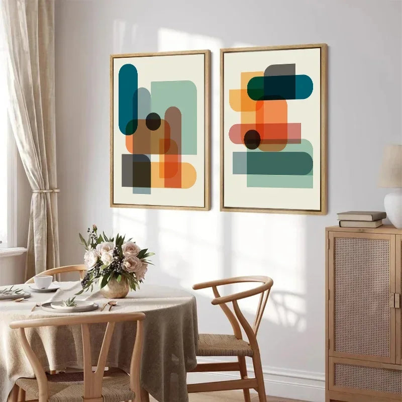 Dining room with abstract art on the wall, table, and chairs.