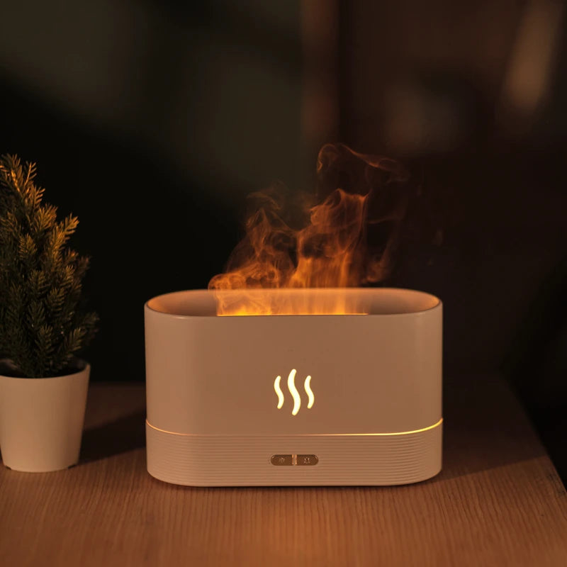 White water flame aromatherapy diffuser with warm mist effect on a wooden table