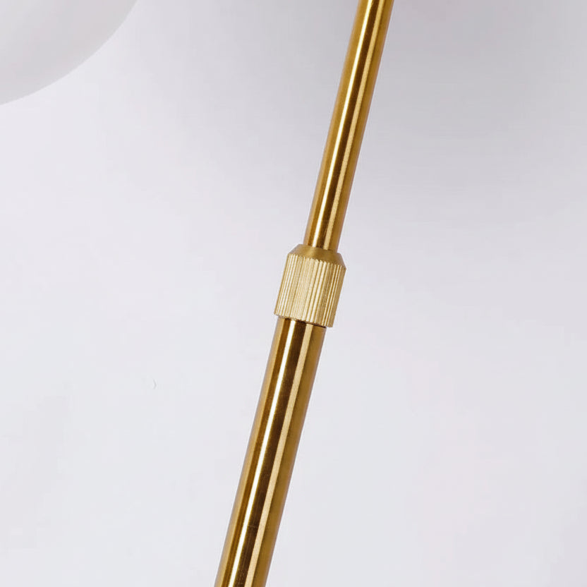 Adjustable metal frame detail in gold finish