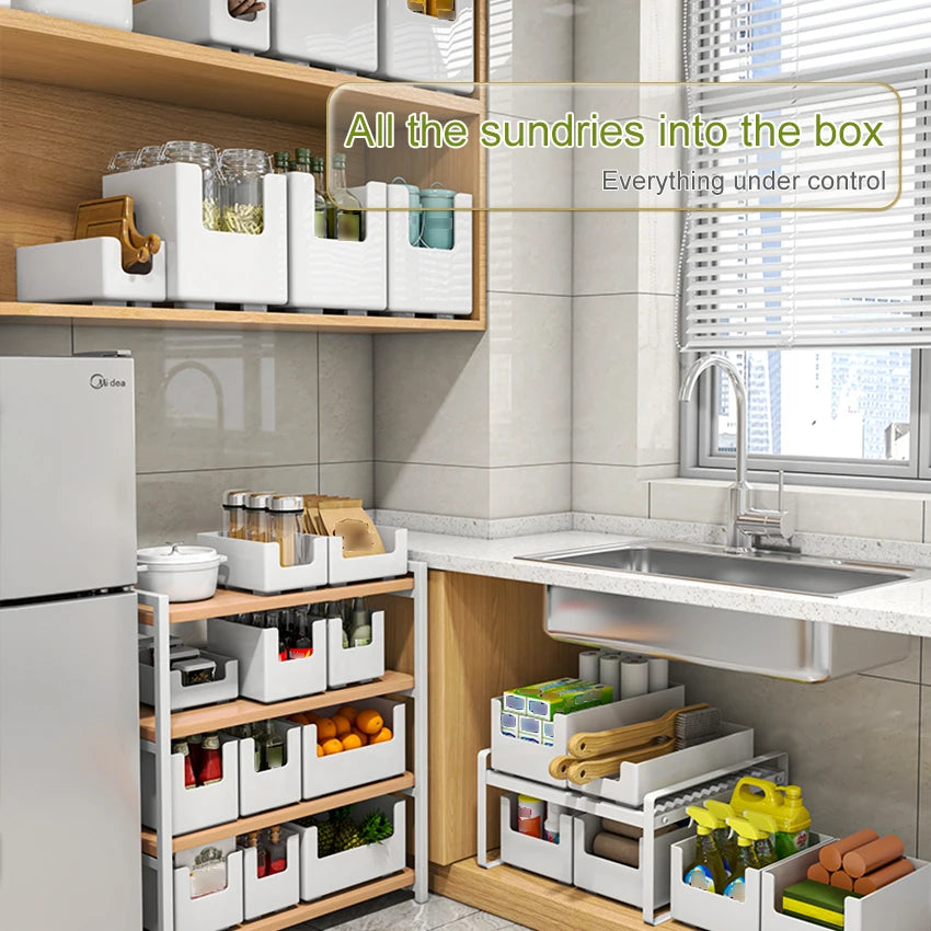 Kitchen with organized storage solutions and text 'All the sundries into the box. Everything under control'.