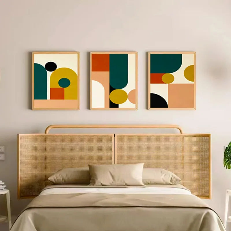 Bedroom with a wicker headboard and abstract wall art