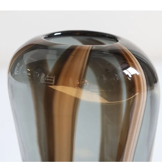 Close-up of high-gloss artistic glass swirl detail