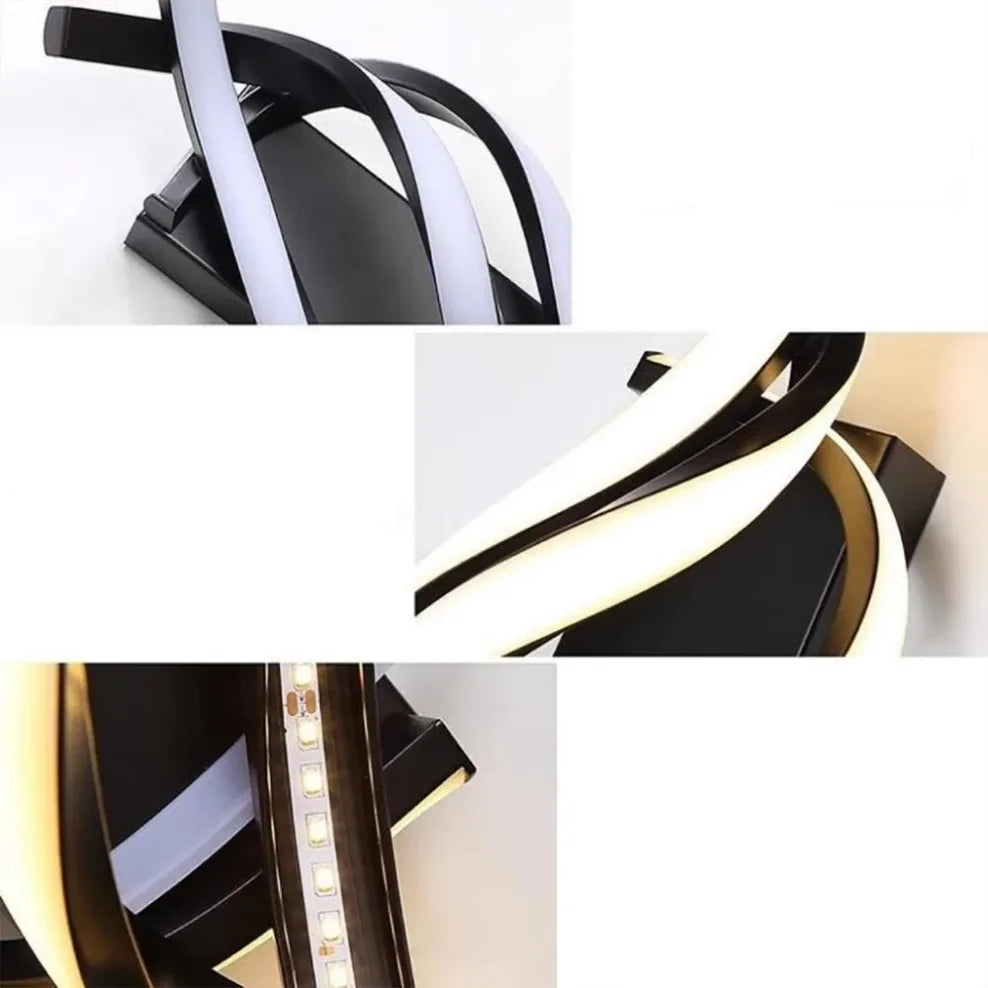 Close-up of curved aluminium spiral wall lamp with integrated LED strip