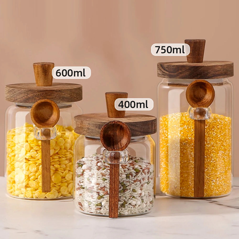 Set of glass jars with wooden lids and measuring labels on a neutral background