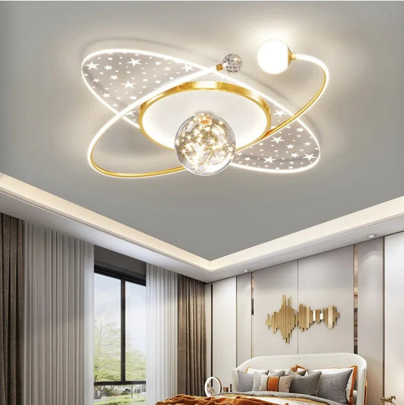 Gold elliptical planet LED ceiling light with gold frame, crystal ball and star panels, 60×60cm