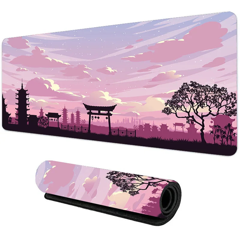 Wide mouse pad with pink twilight temple silhouette and soft pastel sky, shown flat and rolled
