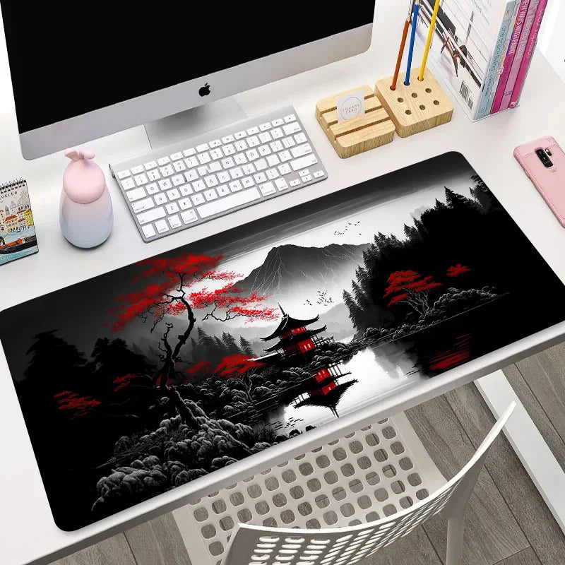 Large mouse pad with dark forest, red pagoda, and red blossom trees reflected in a still river