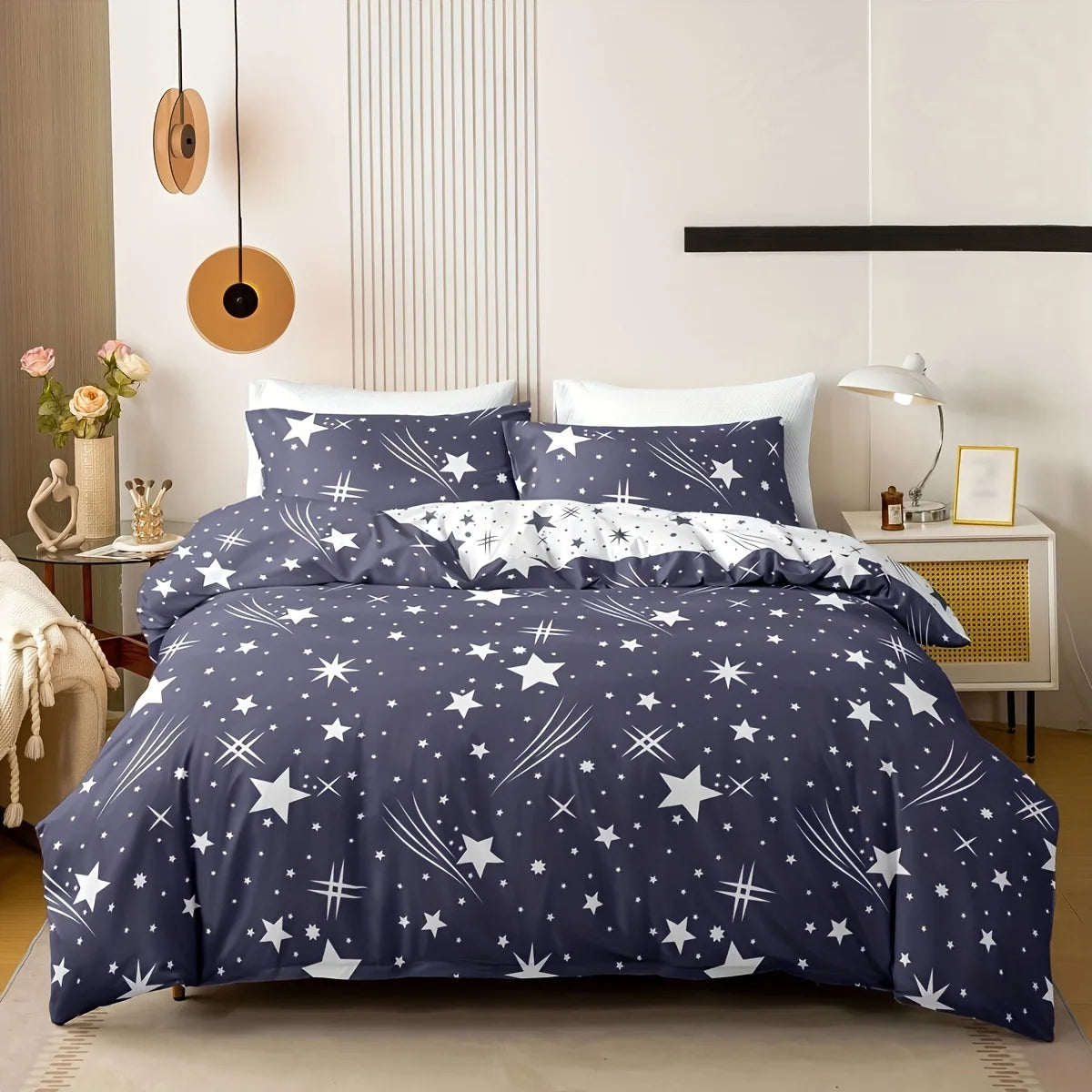 Navy blue bedding set with star pattern in a bedroom setting