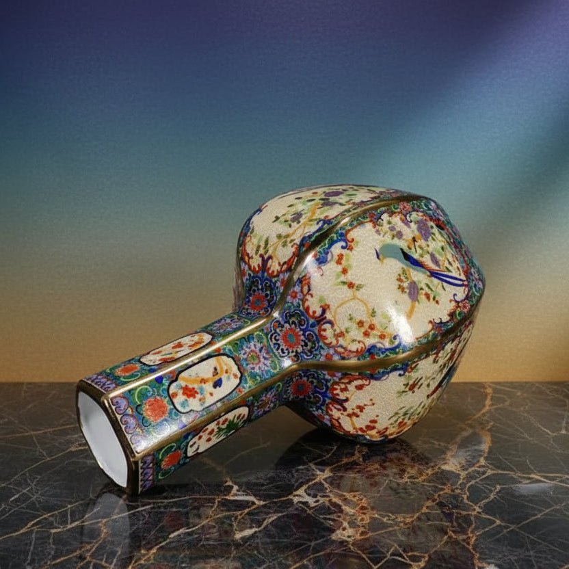 Decorative ceramic object with colourful floral patterns on a grey background
