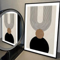 Abstract canvas with layered arch lines above a black semi-circle and a textured taupe circle