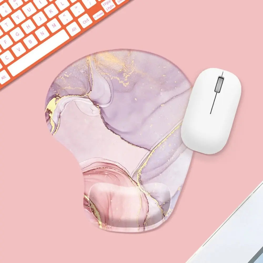 Marble-patterned mouse pad with a white mouse on a pink surface