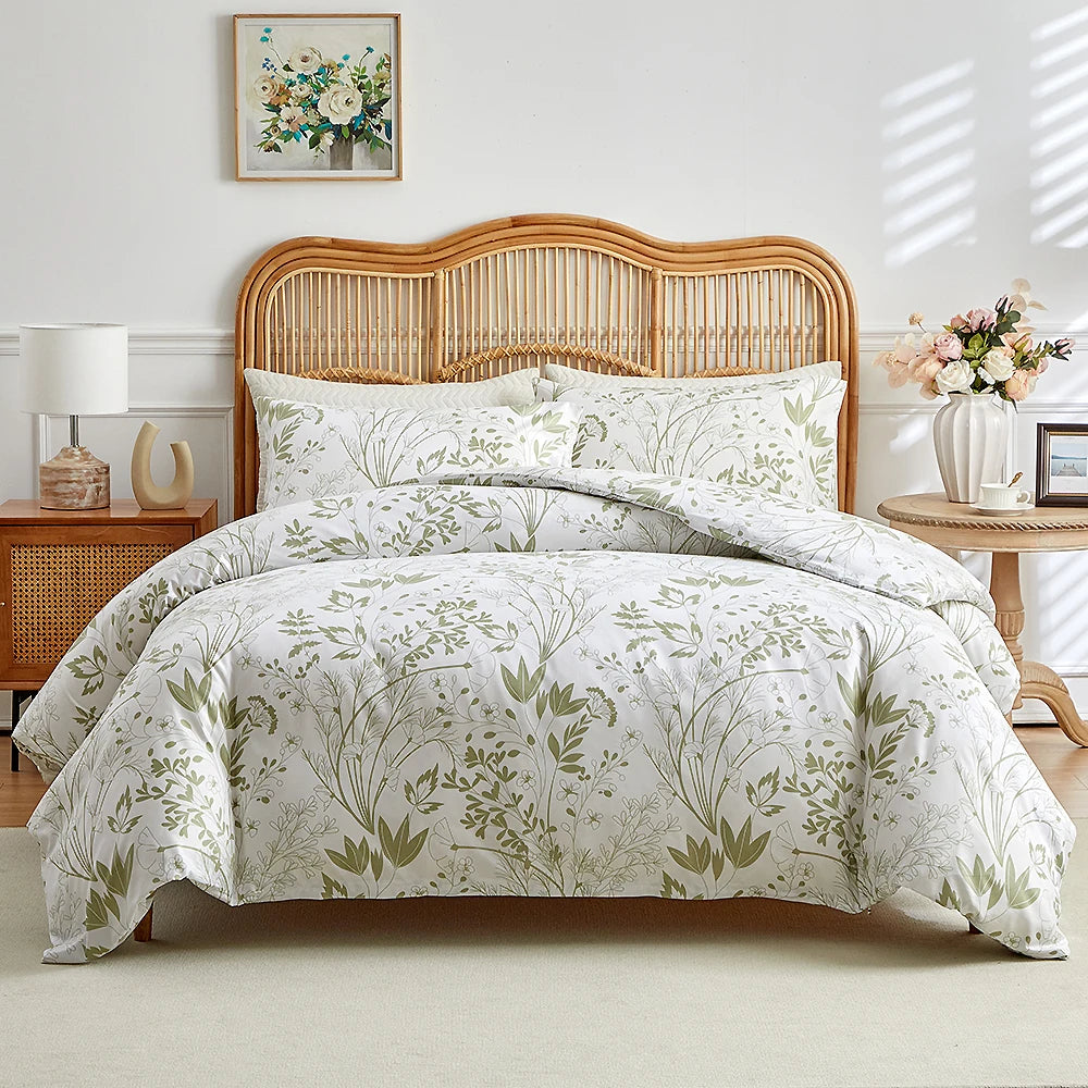 White duvet cover set with soft olive botanical floral pattern and matching pillowcases