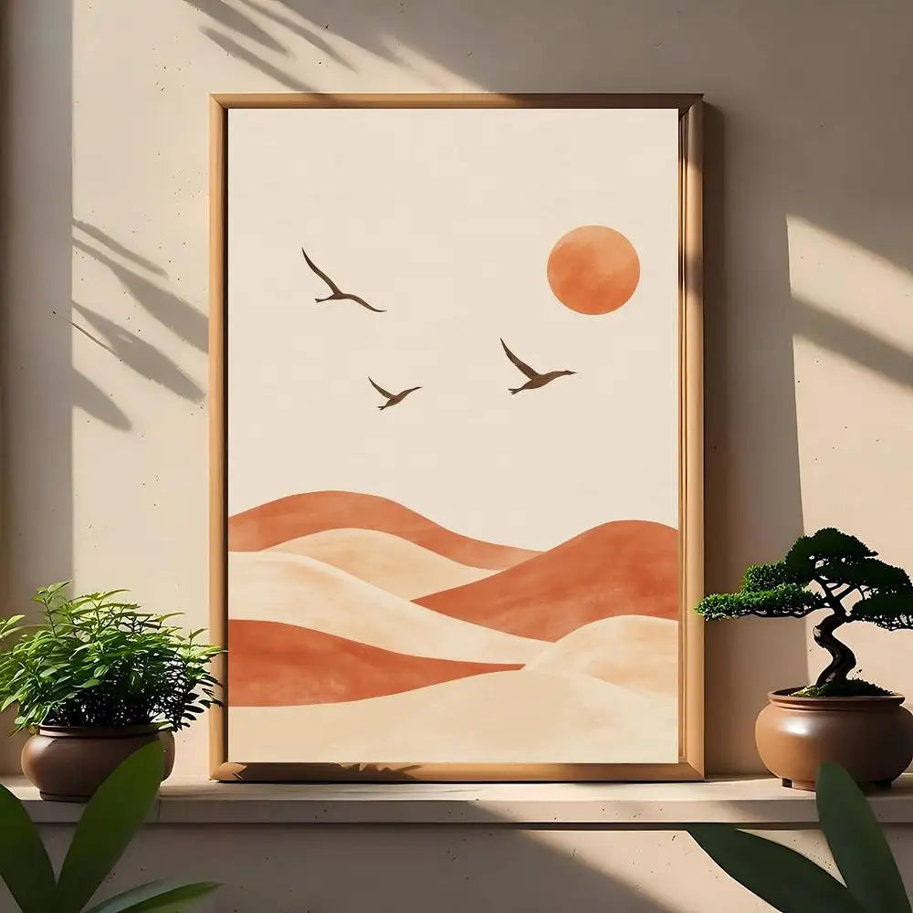 Minimal desert dunes canvas print in terracotta tones with small sun and three birds.