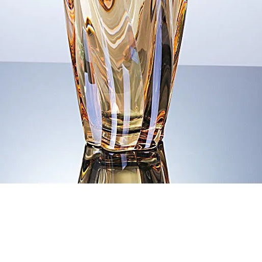 Sunset amber crystal glass vase featuring a rich golden gradient and spiralled texture.