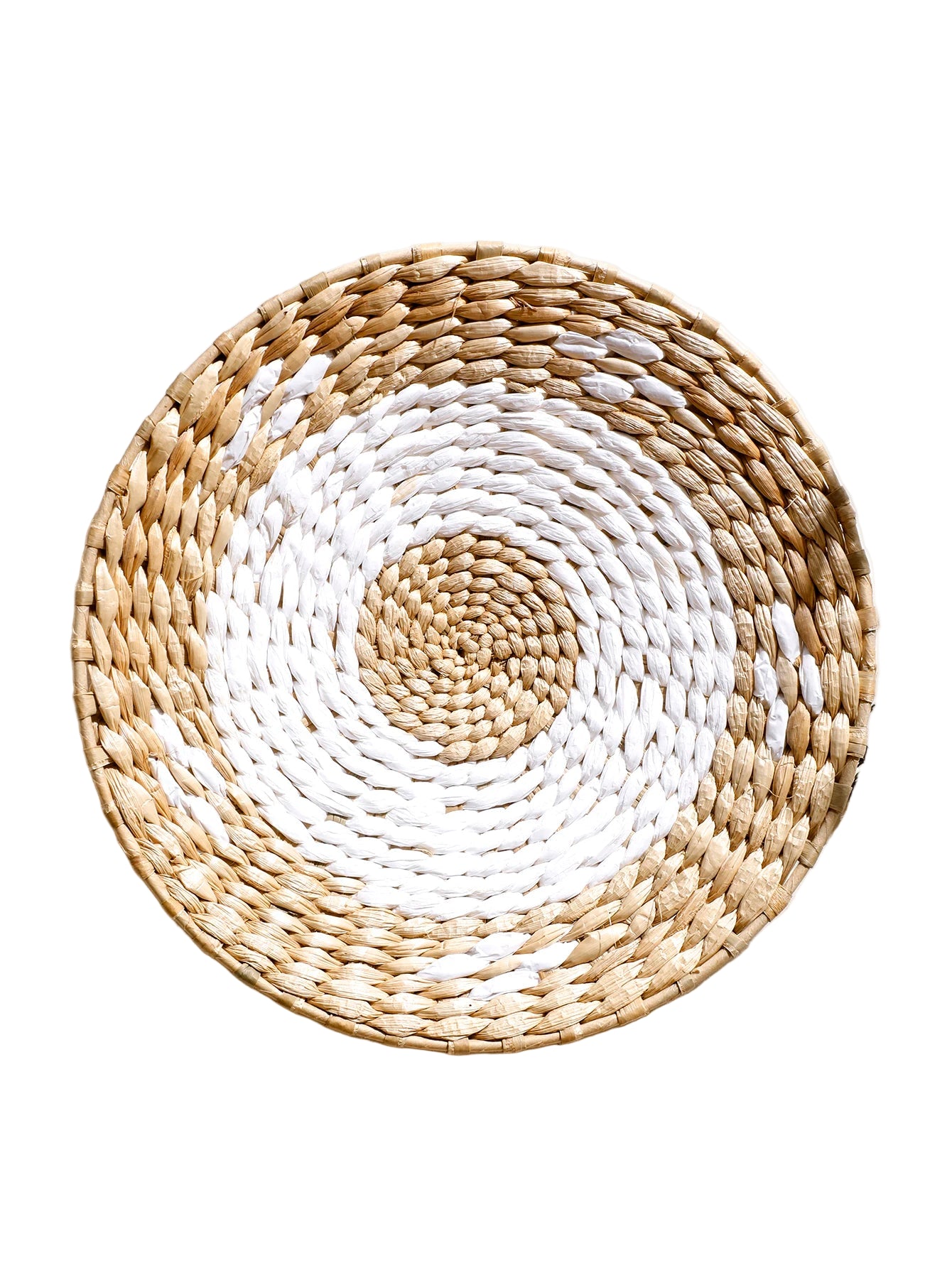 Woven round mat with white and natural brown pattern on a light background