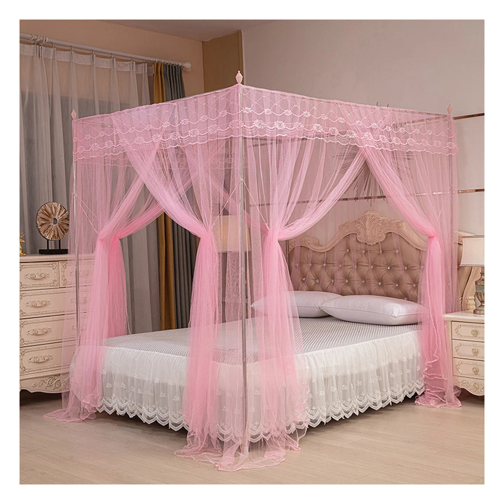 Pink four-poster lace canopy mosquito net draped over a bed