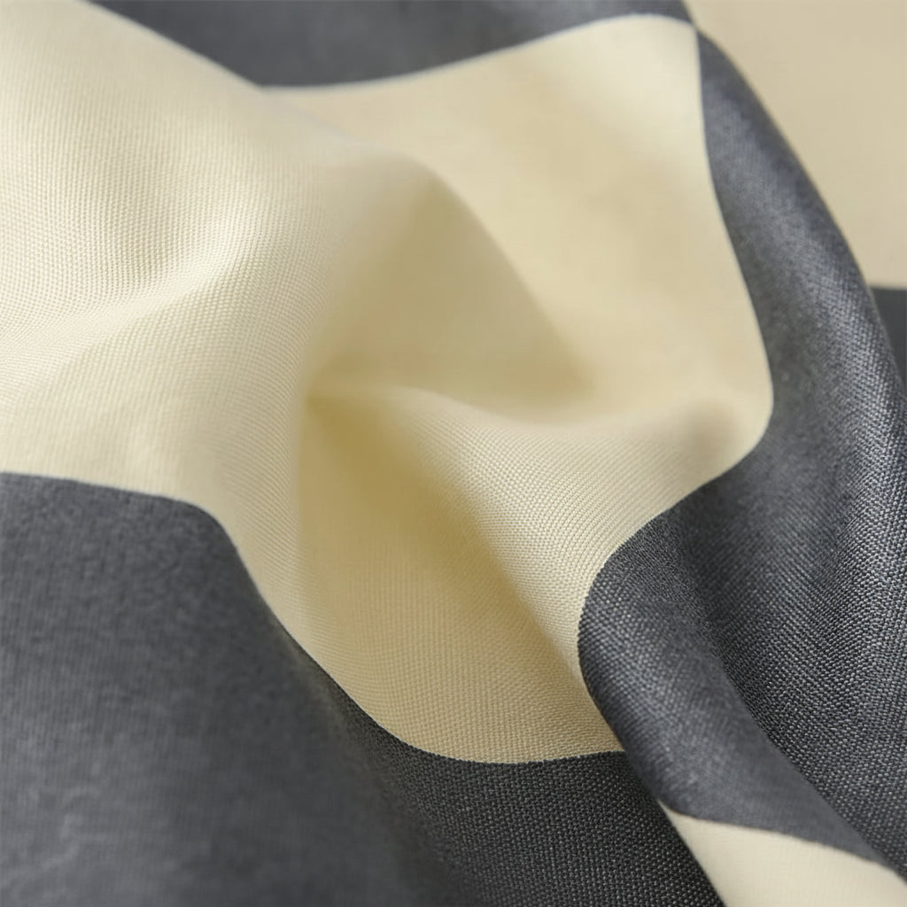Close-up of 100% microfiber fabric with color swatches and feature icons at the bottom.