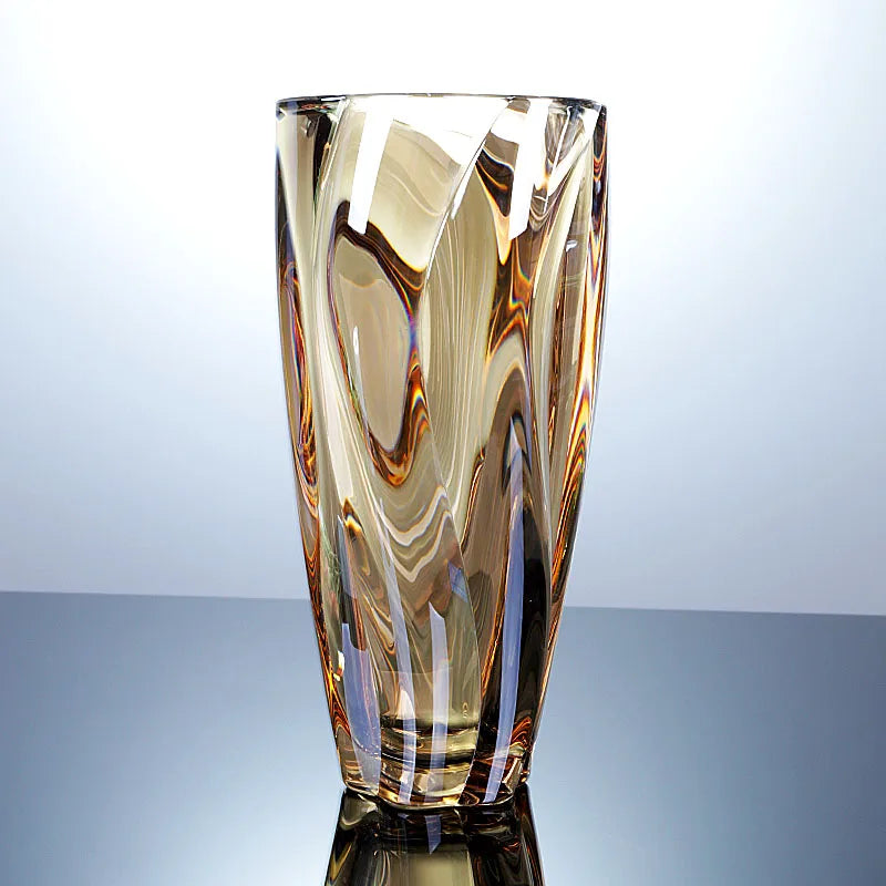 Sunset amber crystal glass vase featuring a rich golden gradient and spiralled texture.