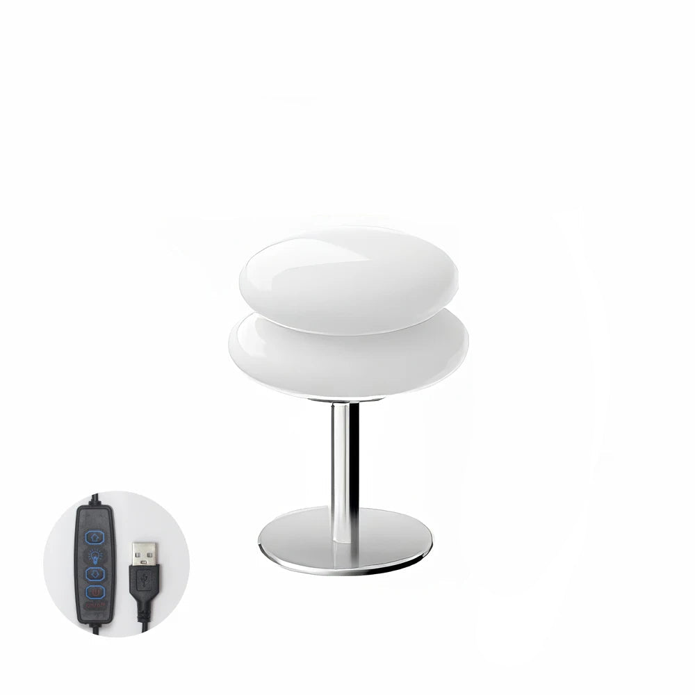 White table lamp and USB cable on a white background