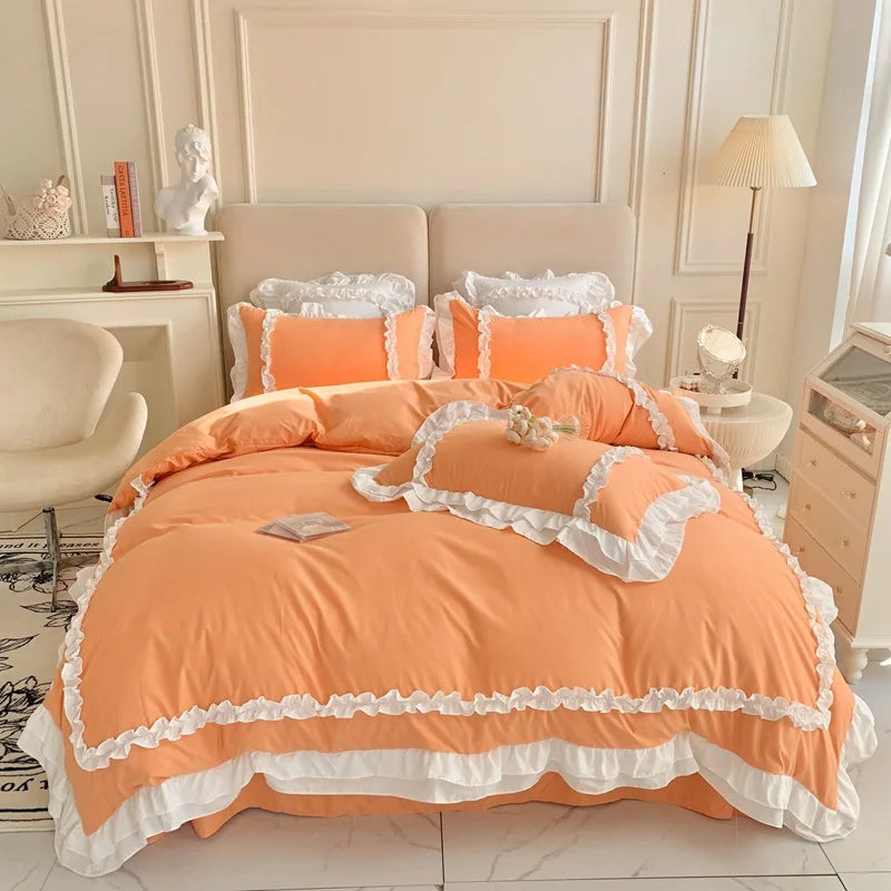 Sunset Orange): Sunset orange ruffle duvet set with white ruffled border detailing