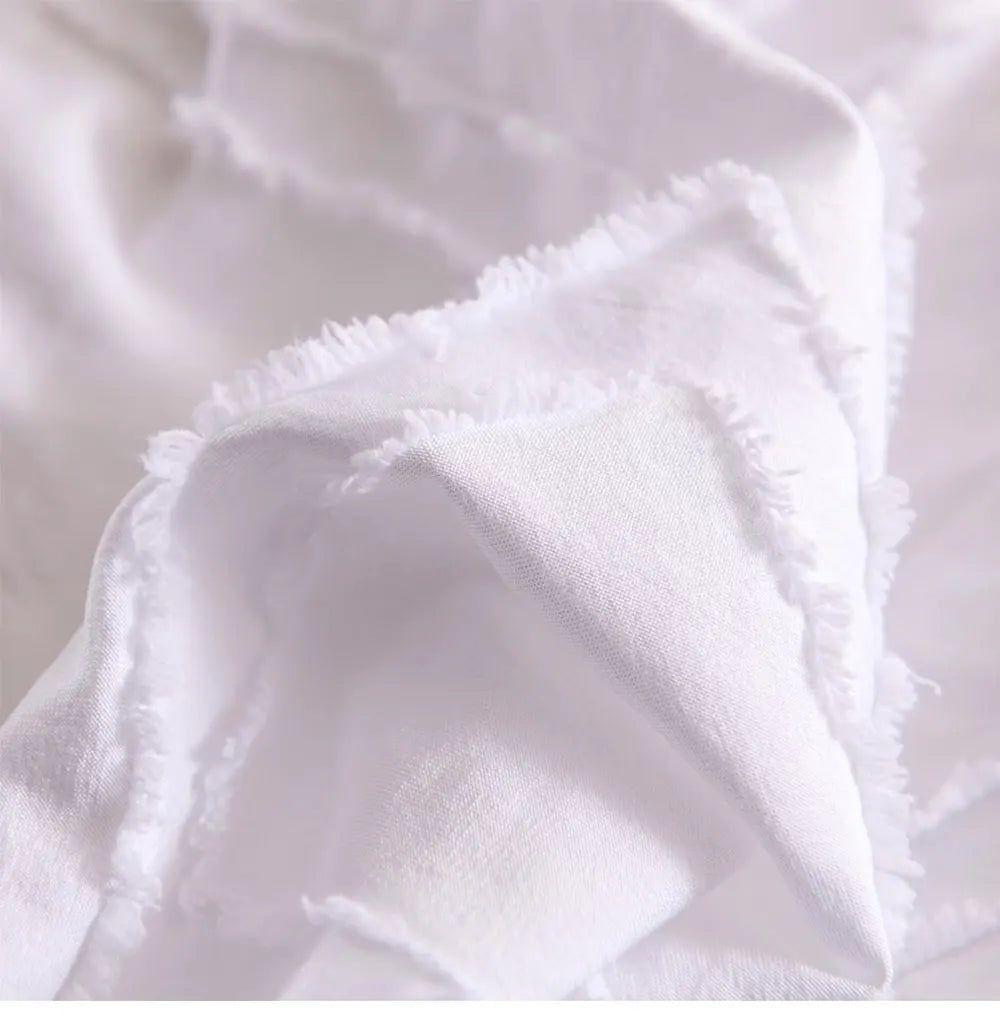Close-up of white fabric with a textured surface