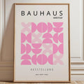 Bauhaus abstract canvas print with soft pink geometric semicircles and line details on a cream background