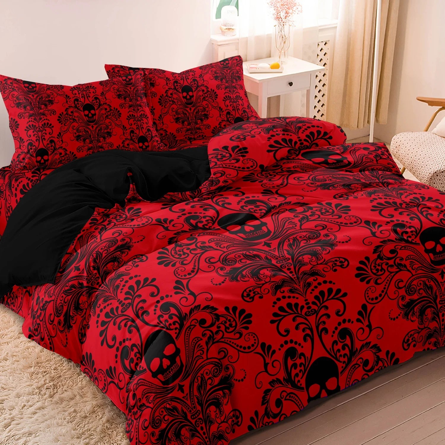 Crimson red skull print duvet cover set styled on a bed with matching pillowcases