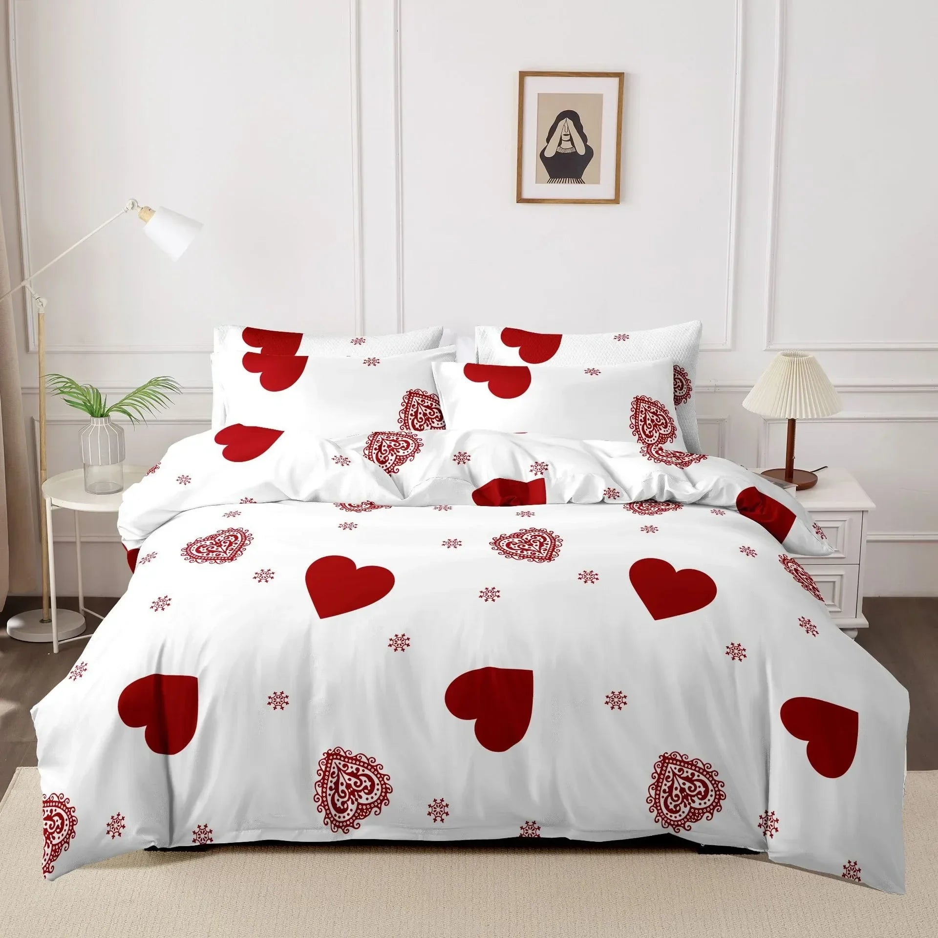 White bedding set with red heart print and matching pillowcases