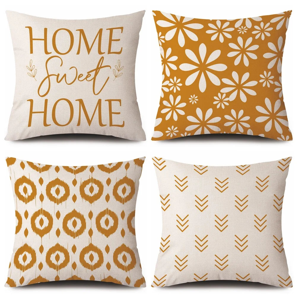 Four decorative cushion covers with different patterns and text on a white background
