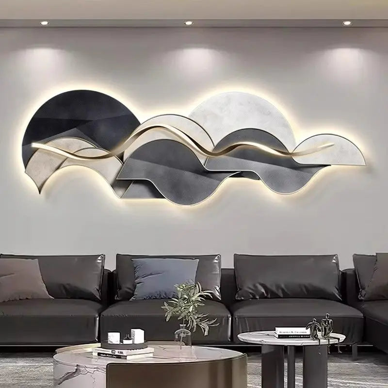 Large sculptural LED wall light with warm backlit glow and wave-inspired abstract design
