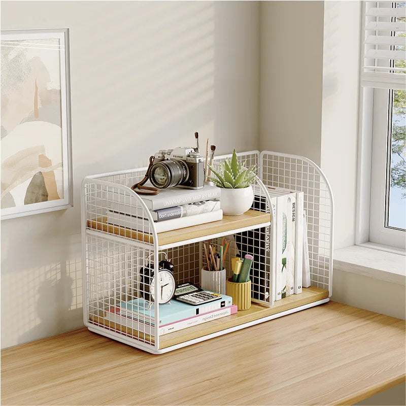 White mesh shelf with wooden top in a room with a window and framed picture.