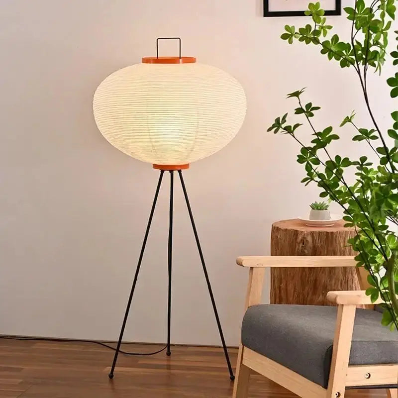 Large rice paper floor lamp on a black metal tripod base with wooden trim, 120cm tall and 53cm wide.