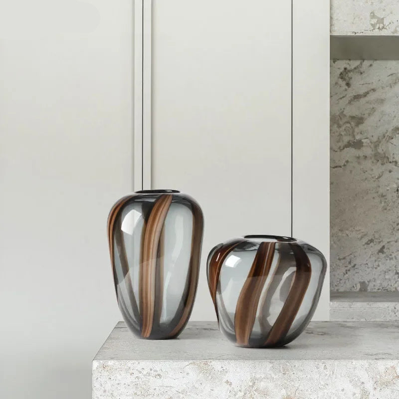 Modern decorative vases on a marble coffee table