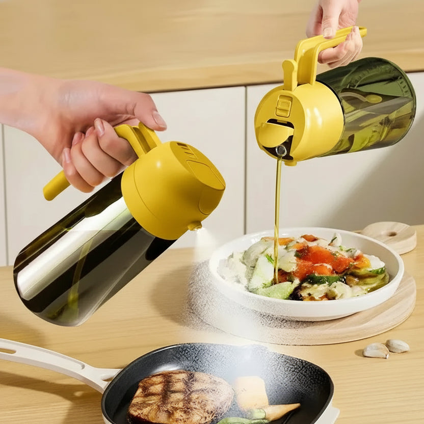 Person pouring oil from a bottle into a bowl of food on a wooden table.