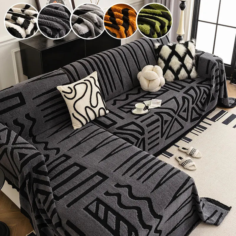 Dark Grey tribal print sofa cover on L-shaped couch with cushions