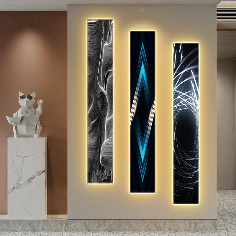 Modern wall art with abstract designs on a neutral wall, featuring a marble statue.