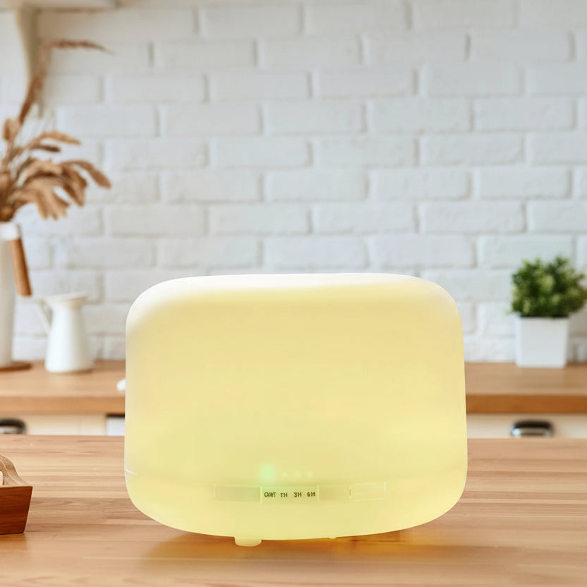 Aromatherapy diffuser on a wooden surface with a blurred background