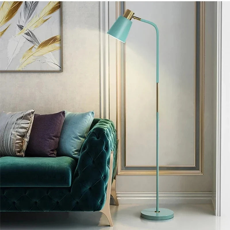Green Nordic floor lamp with brass accent and round base