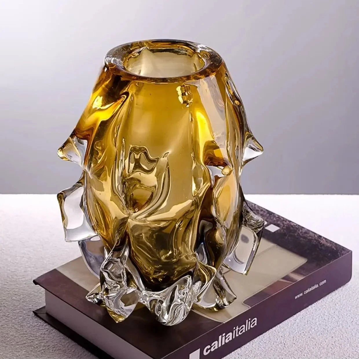 Small 21.5cm thick crystal glass vase featuring an organic molten silhouette.